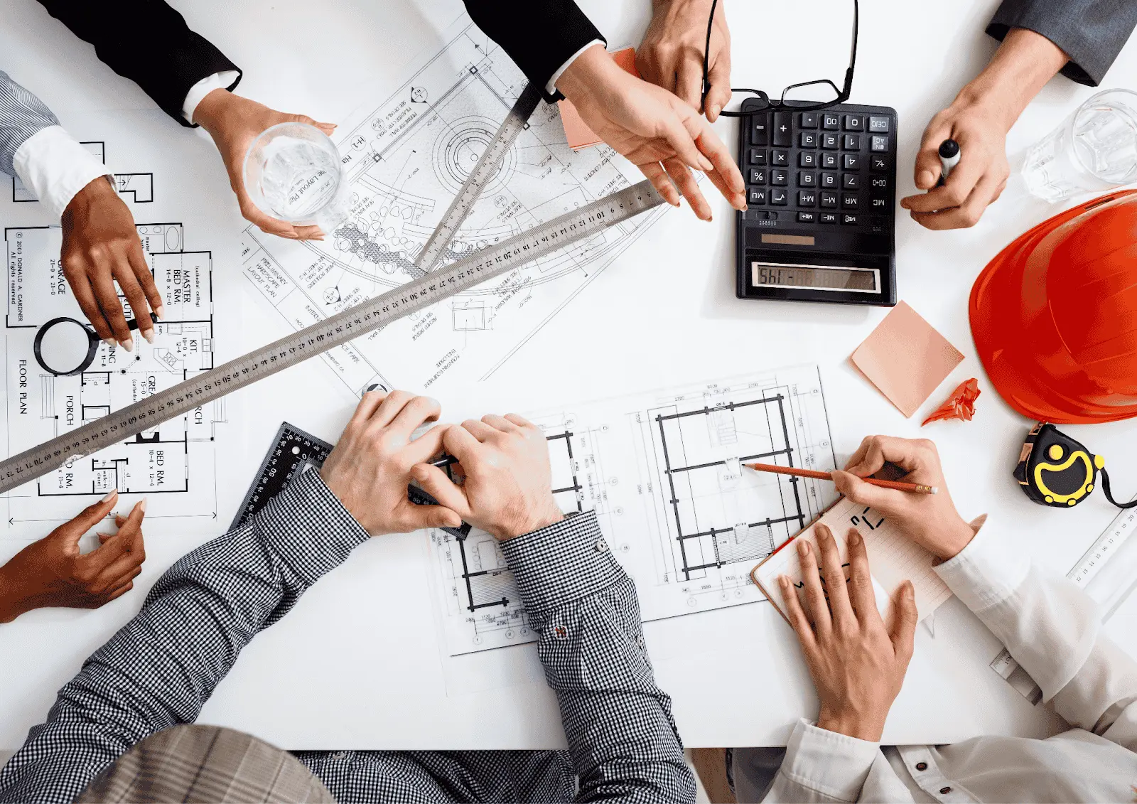 Team of engineering consultants discussing project plans and schedules