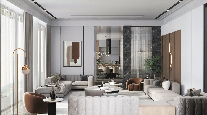 Interior designers arranging modern furniture and decor to create stylish interiors.